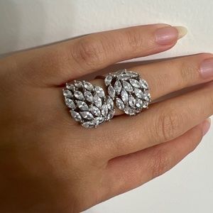 Silver Ring size 6, adjusts to bigger size